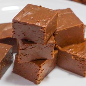 Easy Chocolate Peanut Fudge is an easy microwave fudge recipe made with frosting, chocolate chips and smooth peanut butter.