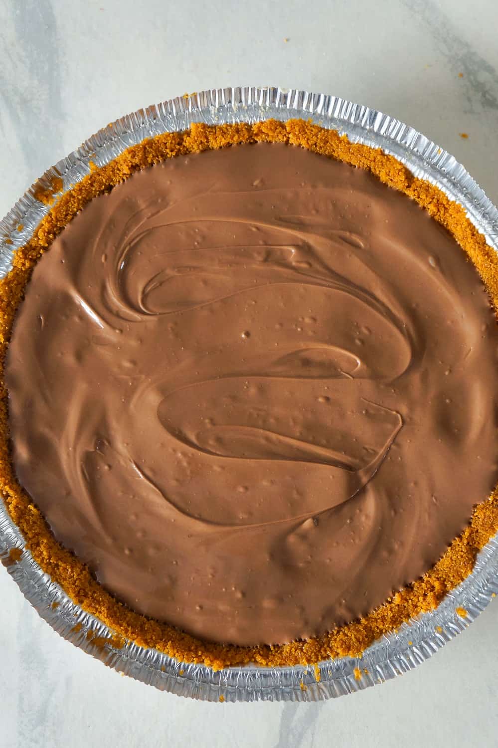 chocolate spread on top of cookie dough pie