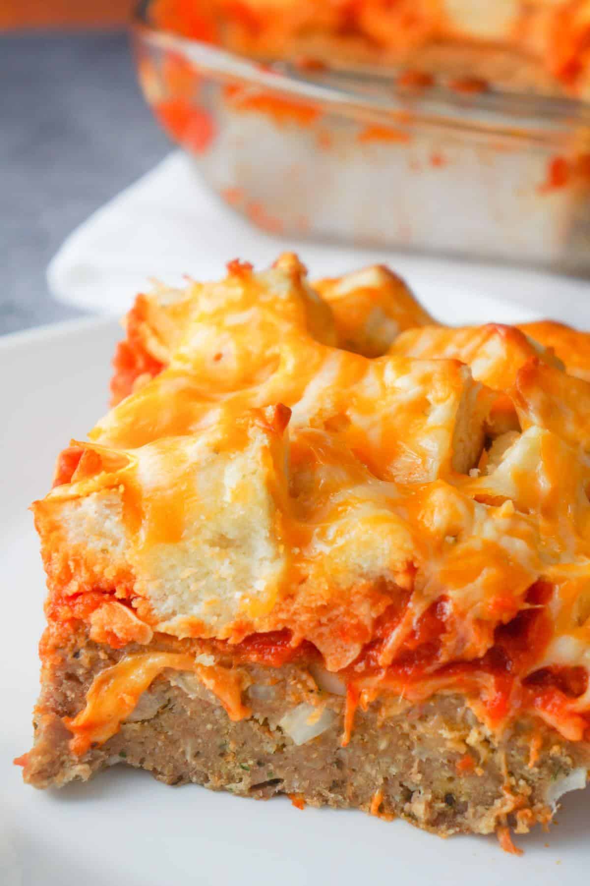 Easy Ground Chicken Casserole is a hearty ground chicken recipe topped with marinara sauce, garlic bagel chunks and shredded cheese.