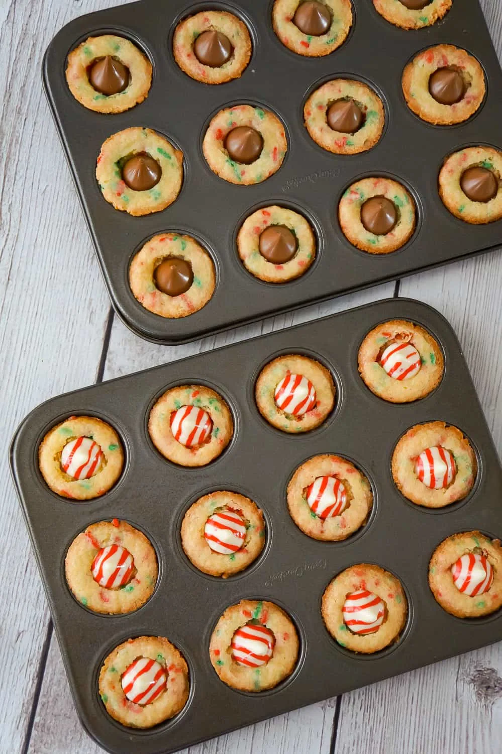 Christmas Sugar Cookie Cups with Hershey's Kisses in mini muffin tins.