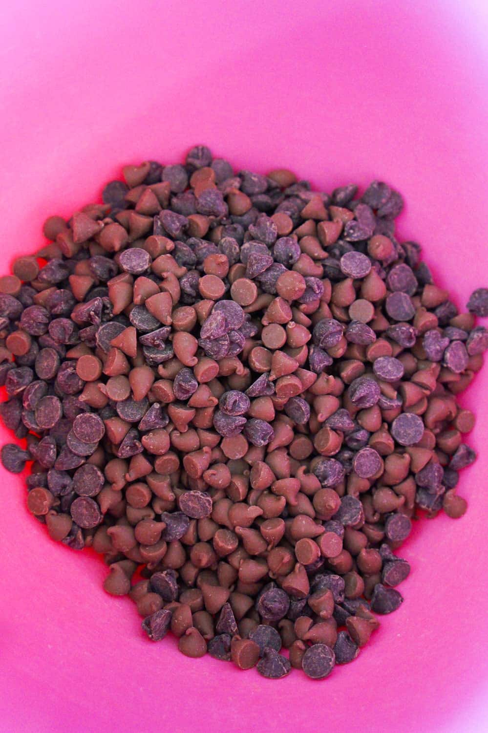 semi sweet chocolate chips and milk chocolate chips in a mixing bowl