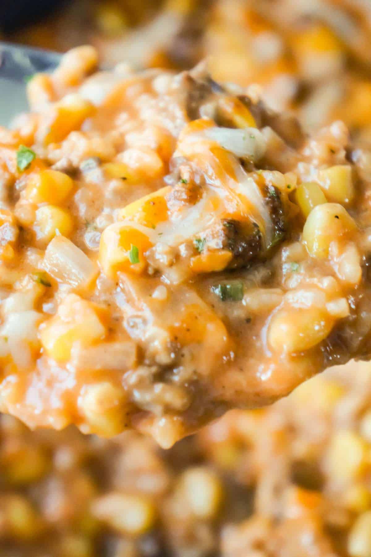 Cheesy Tomato Ground Beef and Rice is an easy ground beef dish loaded with corn, cheese and rice all tossed in a creamy tomato sauce.