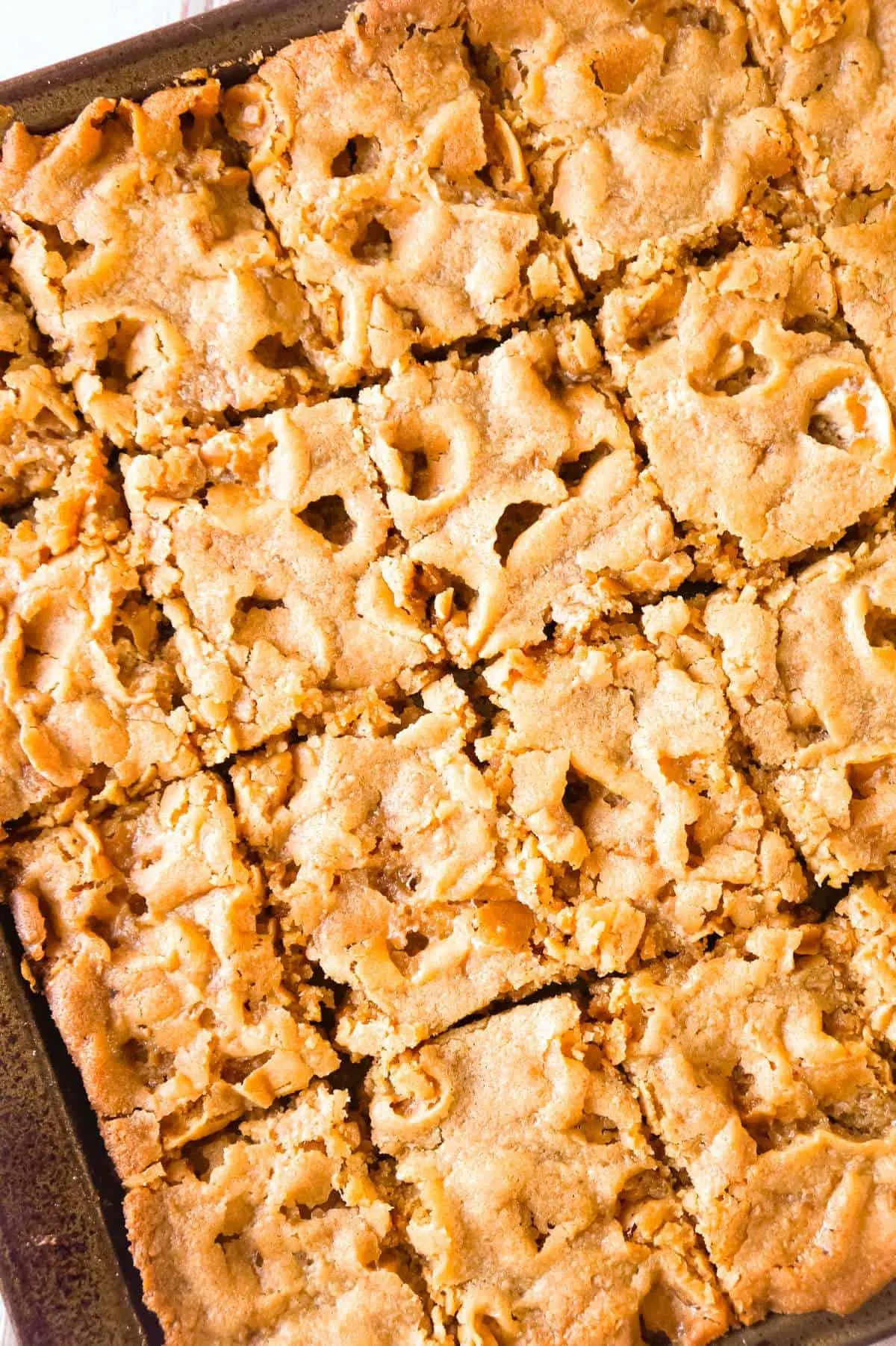 Peanut Butter Marshmallow Cookie Bars are soft and chewy peanut butter cookies loaded with mini marshmallows and toffee bits.
