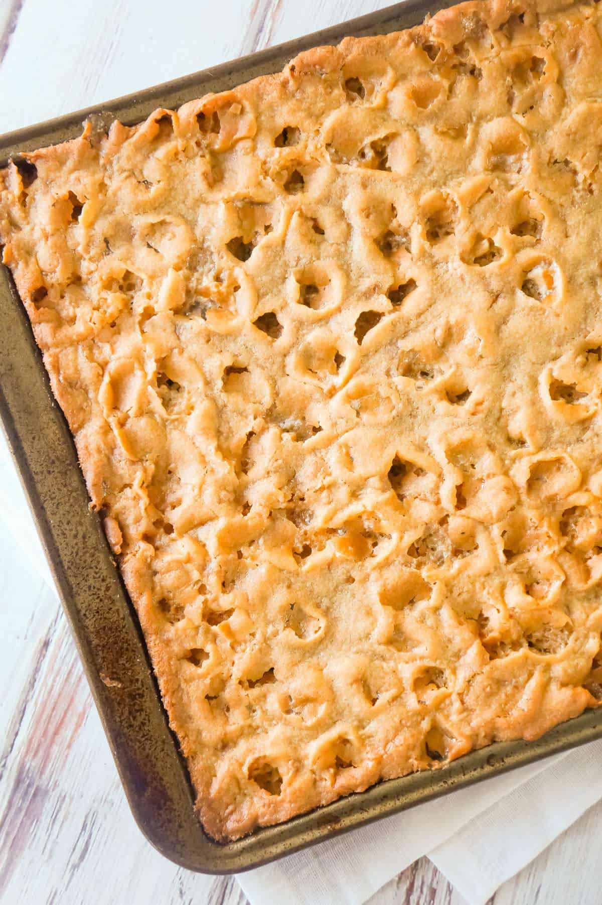 Peanut Butter Marshmallow Cookie Bars are soft and chewy peanut butter cookies loaded with mini marshmallows and toffee bits.