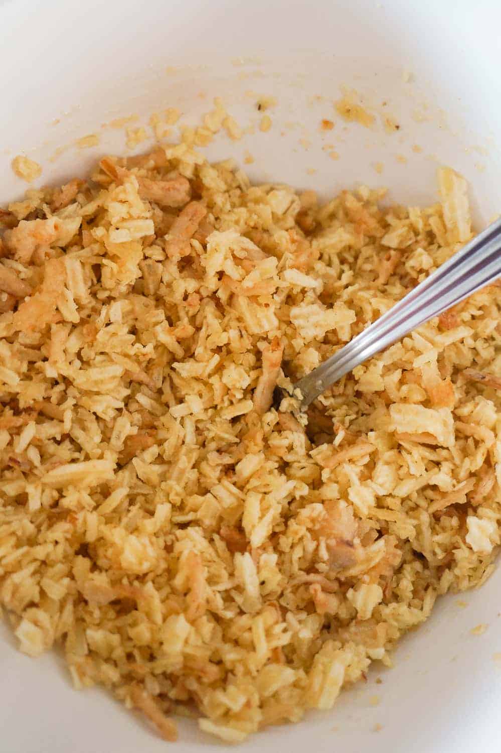 crushed potato chip mixture in a mixing bowl