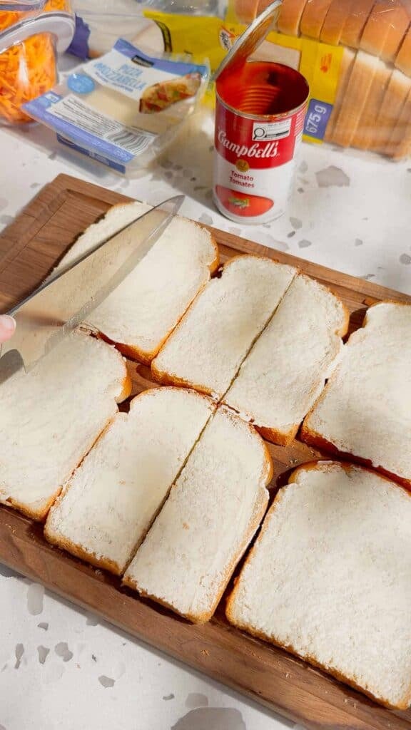 slices of buttered bread on a cutting board