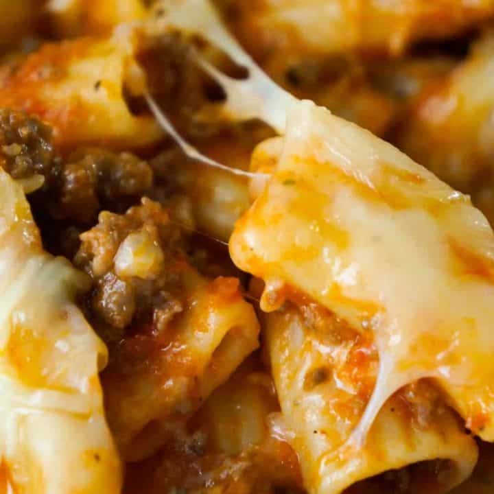 Baked Rigatoni Bolognese is an easy pasta dinner recipe loaded with cheese. This pasta with ground beef and marinara sauce, is topped with Mozzarella and Parmesan cheese.