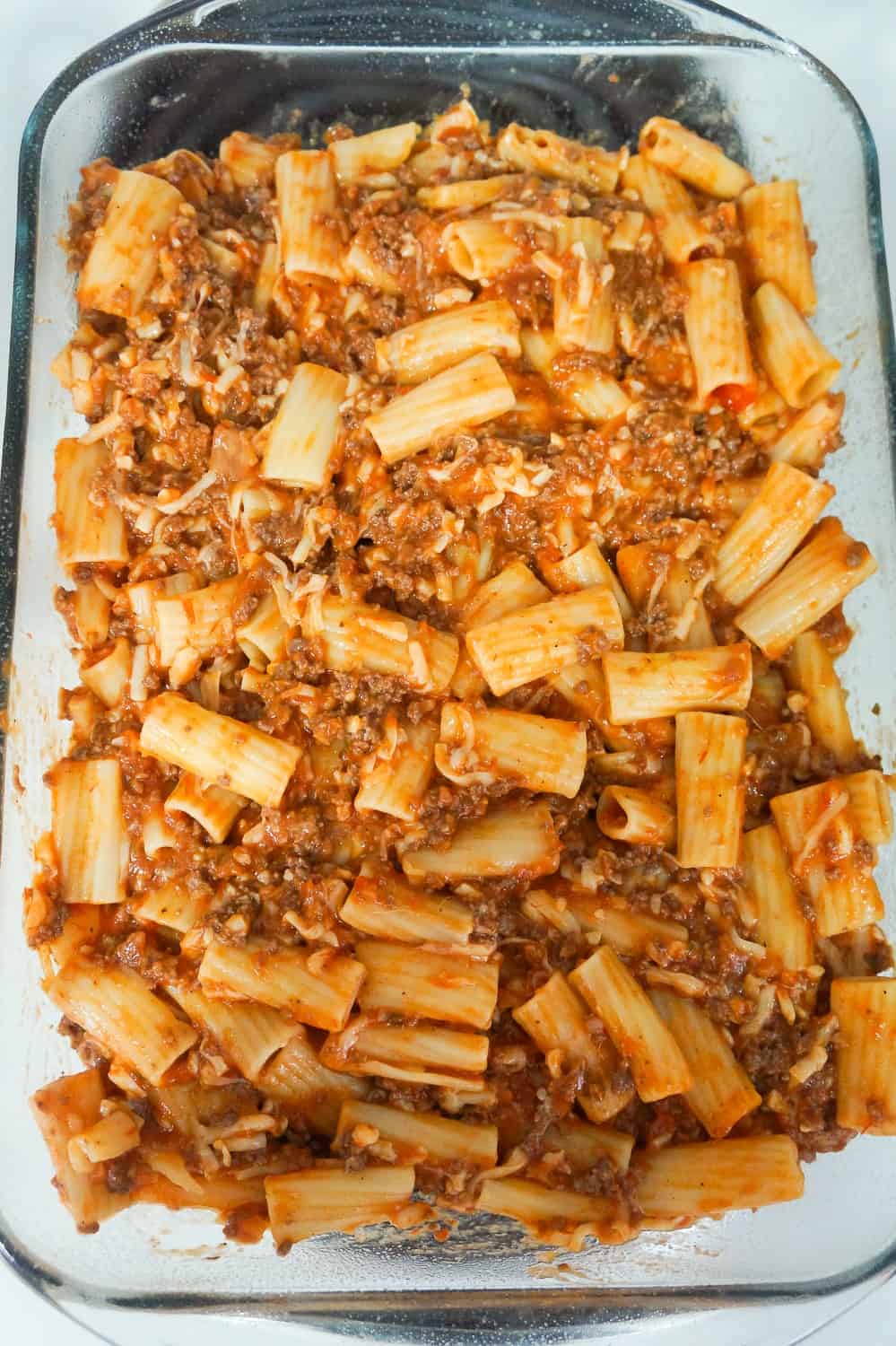 rigatoni bolognese in a baking dish