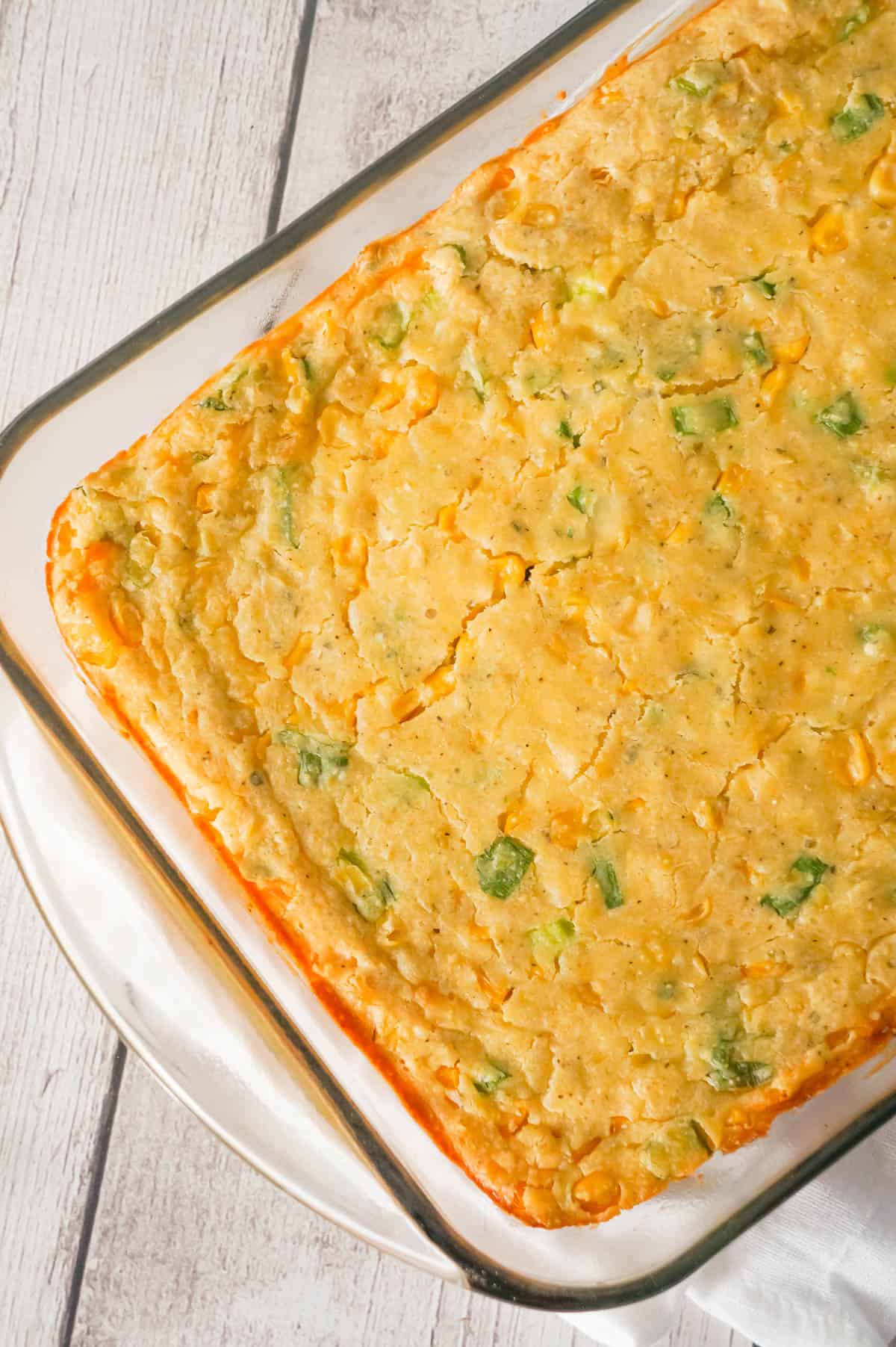 Corn Casserole is a delicous holiday side dish recipe made with cornbread mix and loaded with corn, green onions, Havarti cheese and Phildelphia Whipped Chive Cream Cheese.