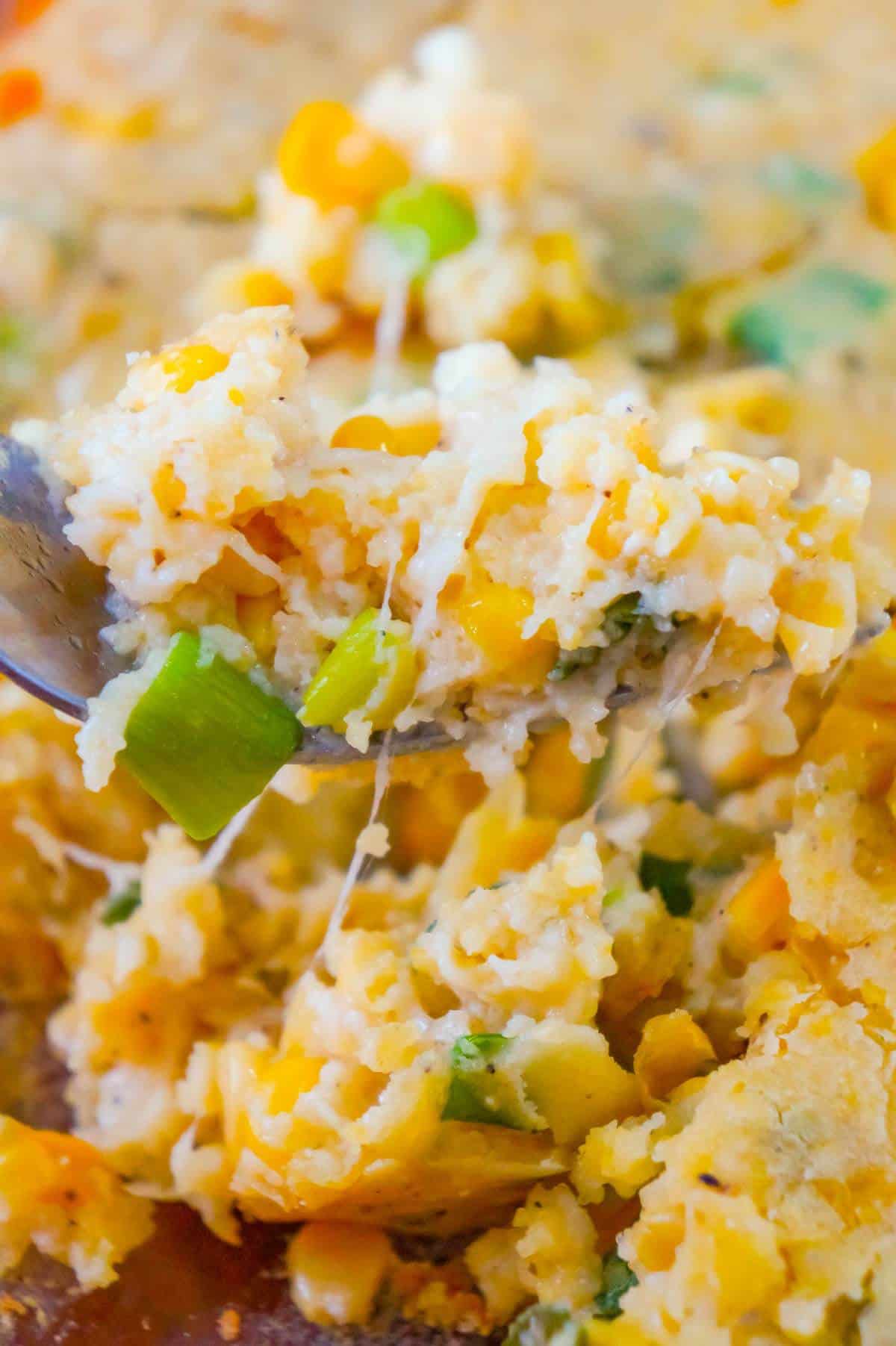 Corn Casserole is a delicous holiday side dish recipe made with cornbread mix and loaded with corn, green onions, Havarti cheese and Phildelphia Whipped Chive Cream Cheese.