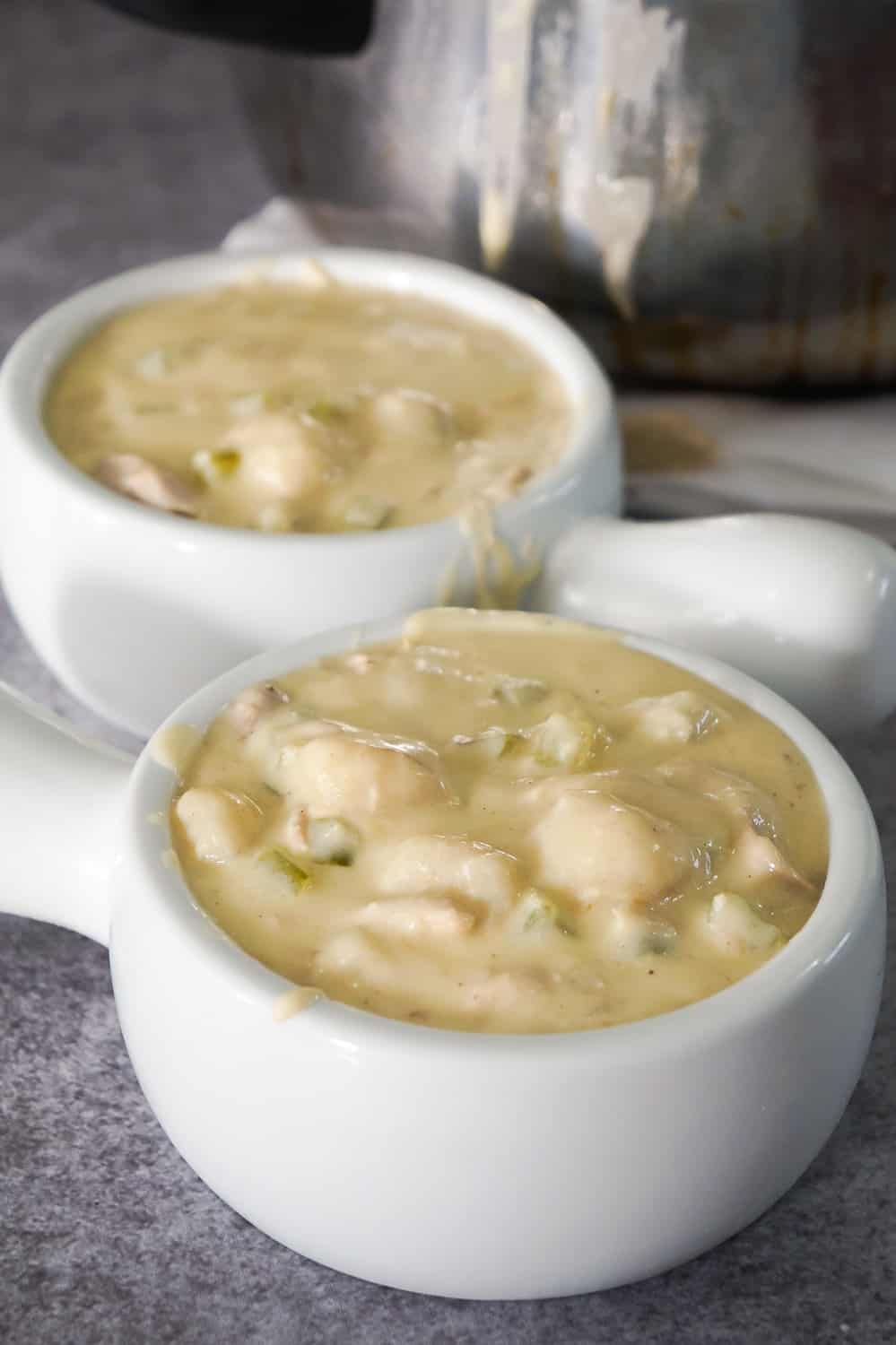 Easy Chicken Gnocchi Soup is a delicious creamy soup recipe perfect for fall. This hearty soup is loaded with shredded chicken and mini potato dumplings.