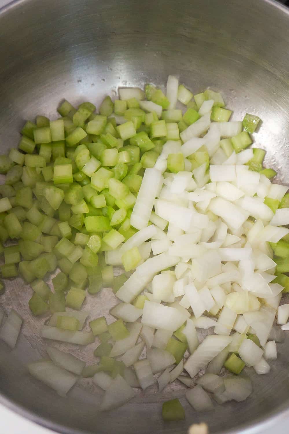 diced onions and diced celery in a large pot.
