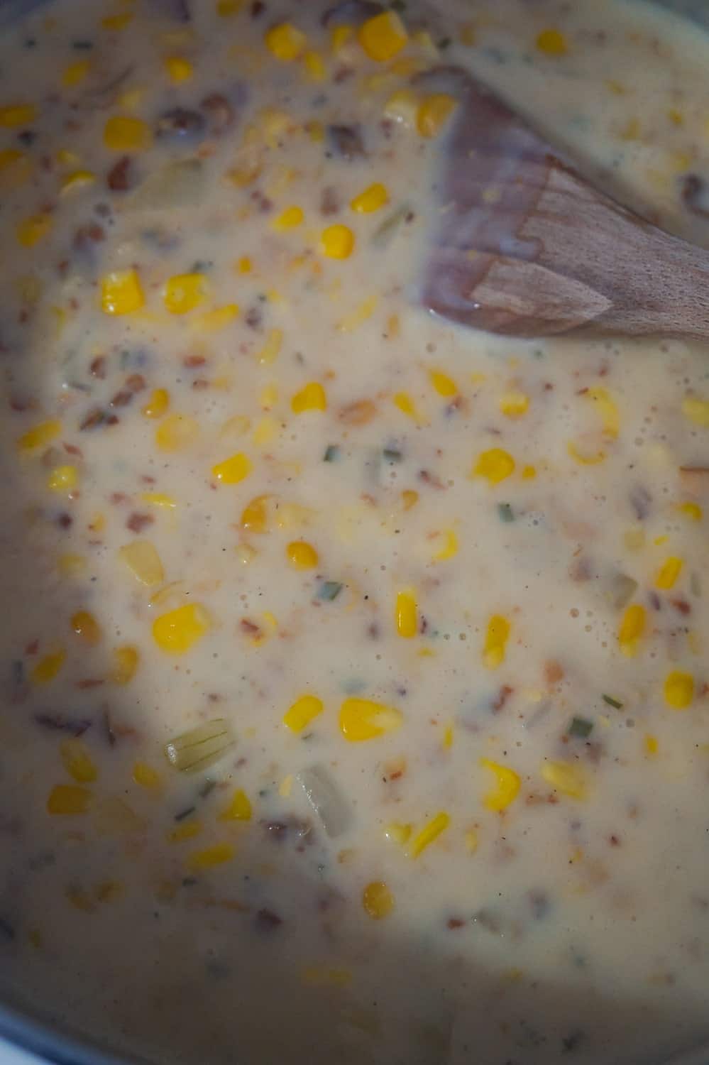 corn chowder simmering in pot