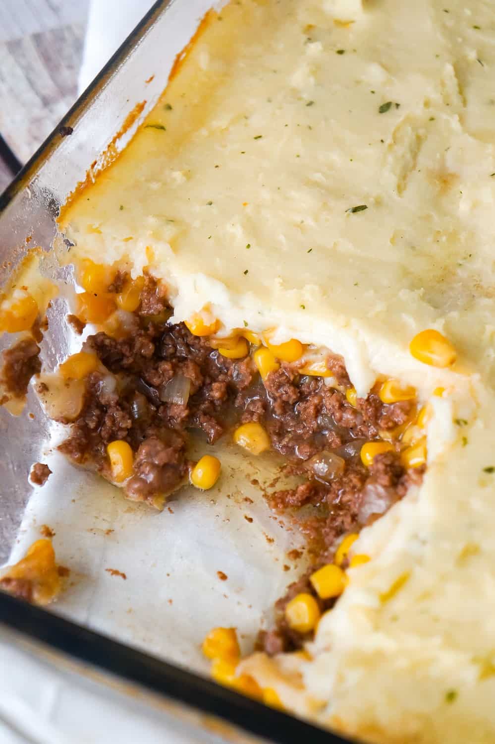 The Best Shepherd's Pie is an easy ground beef dinner recipe. A base of ground beef tossed in brown gravy is topped with corn and creamy mashed potatoes.