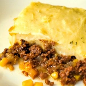 The Best Shepherd's Pie is an easy ground beef dinner recipe. A base of ground beef tossed in brown gravy is topped with corn and creamy mashed potatoes.