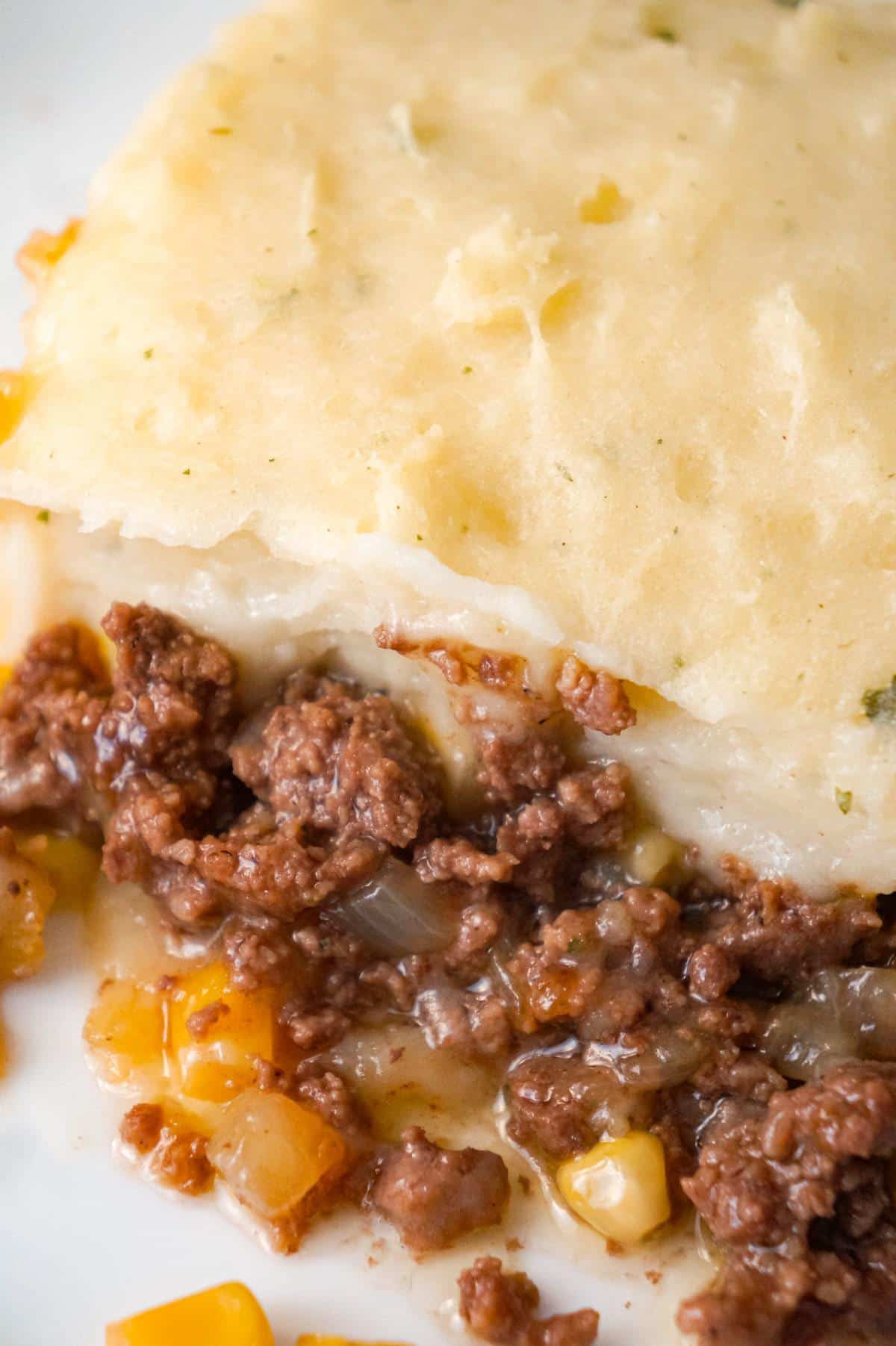 The Best Shepherd's Pie is an easy ground beef dinner recipe. A base of ground beef tossed in brown gravy is topped with corn and creamy mashed potatoes.