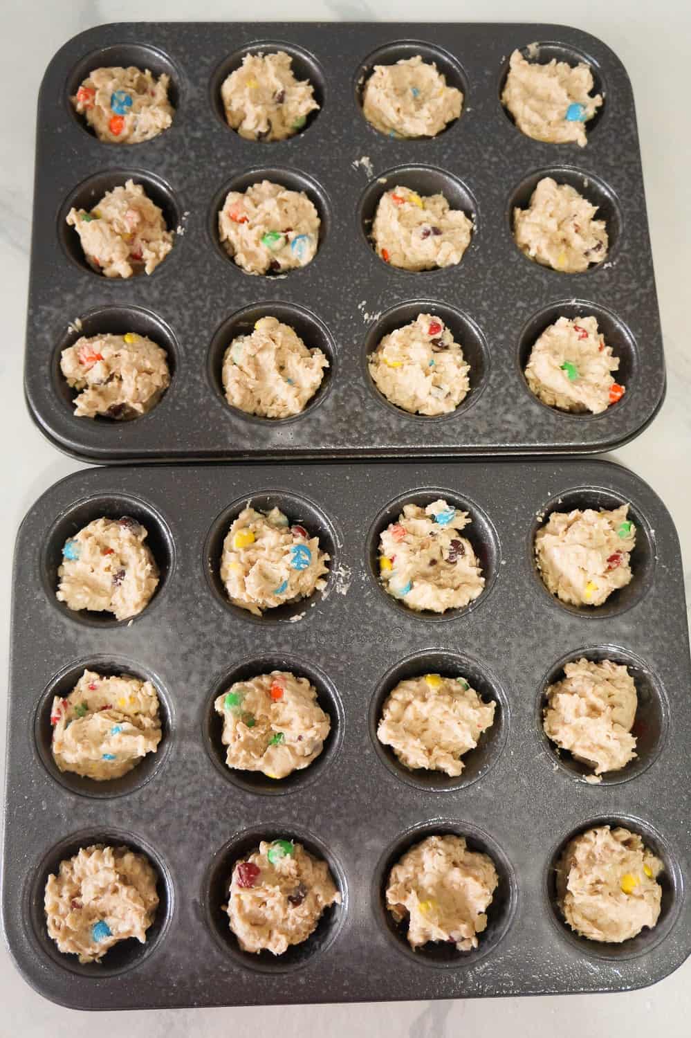 monster cookie dough in mini muffin tins