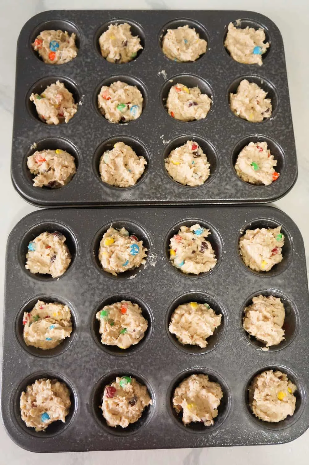 monster cookie dough in mini muffin tins
