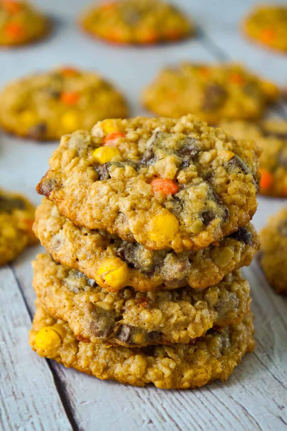 Peanut Butter Oatmeal Cookies with Chocolate Chunks are the perfect dessert recipe for peanut butter lovers. These oatmeal cookies are loaded with mini Reese's Pieces, milk chocolate chips and chocolate chunks.