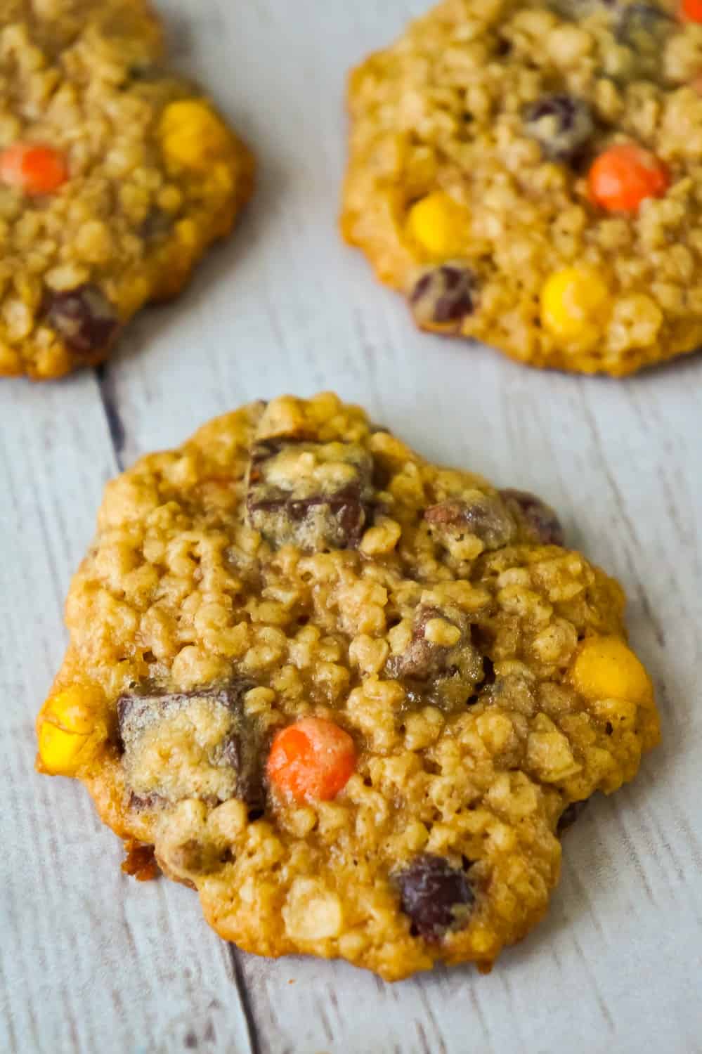 Peanut Butter Oatmeal Cookies with Chocolate Chunks are the perfect dessert recipe for peanut butter lovers. These oatmeal cookies are loaded with mini Reese's Pieces, milk chocolate chips and chocolate chunks. 