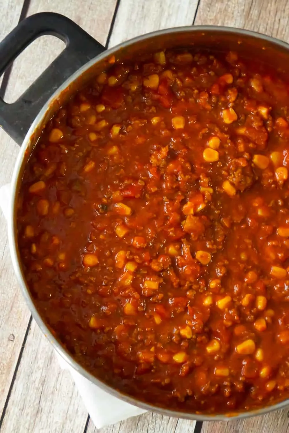 Easy No Bean Chili is a hearty comfort food dish loaded with ground beef and hot Italian sausage meat. This bean free chili, made with chunky salsa and canned corn, packs just the right amount of heat.