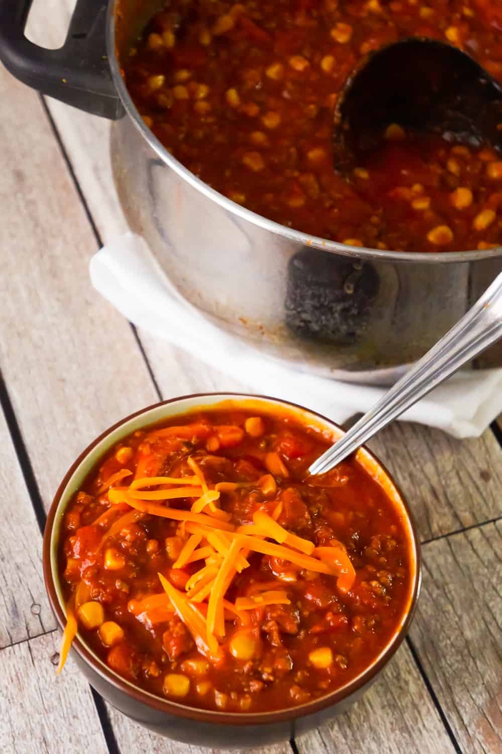 Easy No Bean Chili is a hearty comfort food dish loaded with ground beef and hot Italian sausage meat. This bean free chili, made with chunky salsa and canned corn, packs just the right amount of heat.