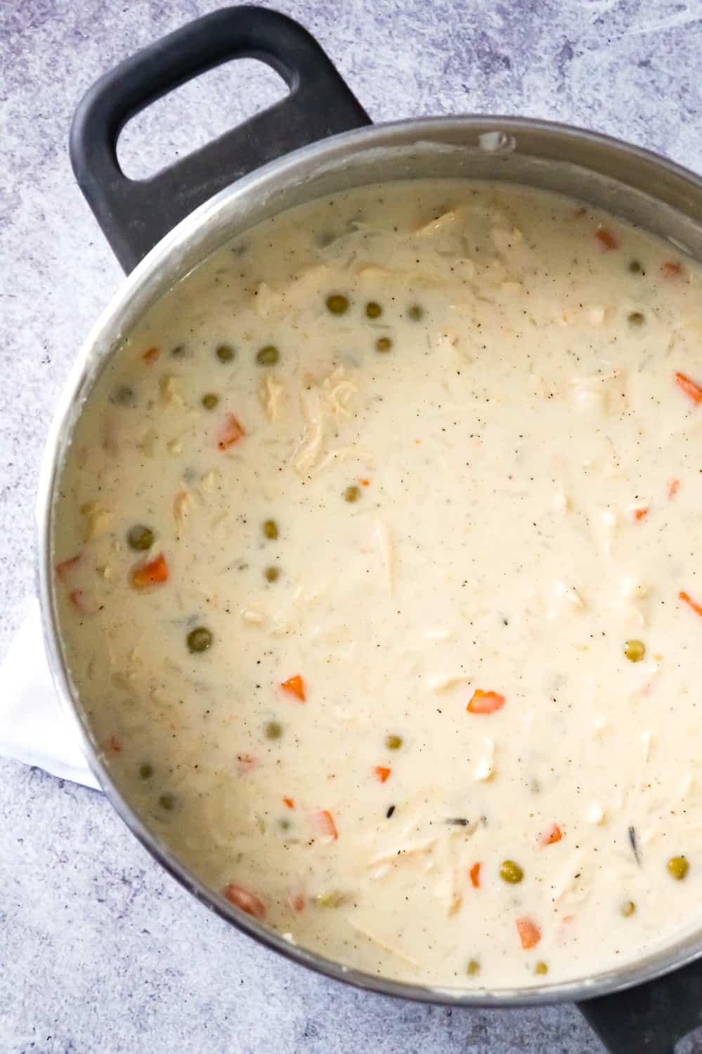 Creamy Turkey Soup with Rice is a perfect fall comfort food recipe. This hearty soup is a great way to use up your leftover Thanksgiving turkey.