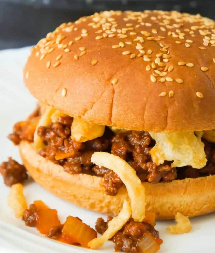 Easy Homemade Sloppy Joes are a simple weeknight dinner recipe your whole family will love. These sandwiches are loaded with ground beef tossed in a sweet tomato sauce and topped with French's fried onions.