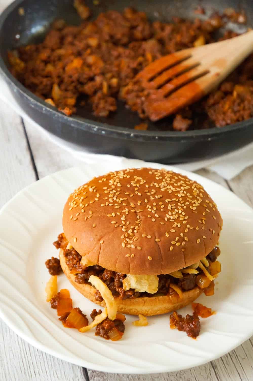 Easy Homemade Sloppy Joes are a simple weeknight dinner recipe your whole family will love. These sandwiches are loaded with ground beef tossed in a sweet tomato sauce and topped with French's fried onions.