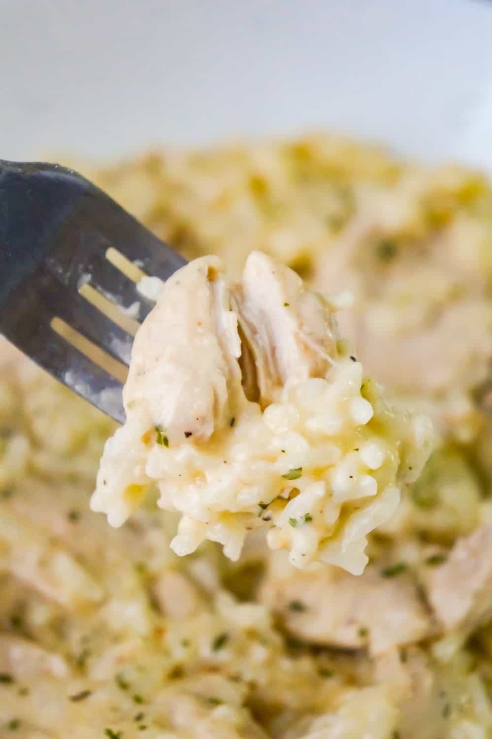 Instant Pot Garlic Parmesan Chicken and Rice is an easy chicken dinner recipe perfect for busy weeknights. This chicken dish is rich and creamy and loaded with Parmesan cheese.