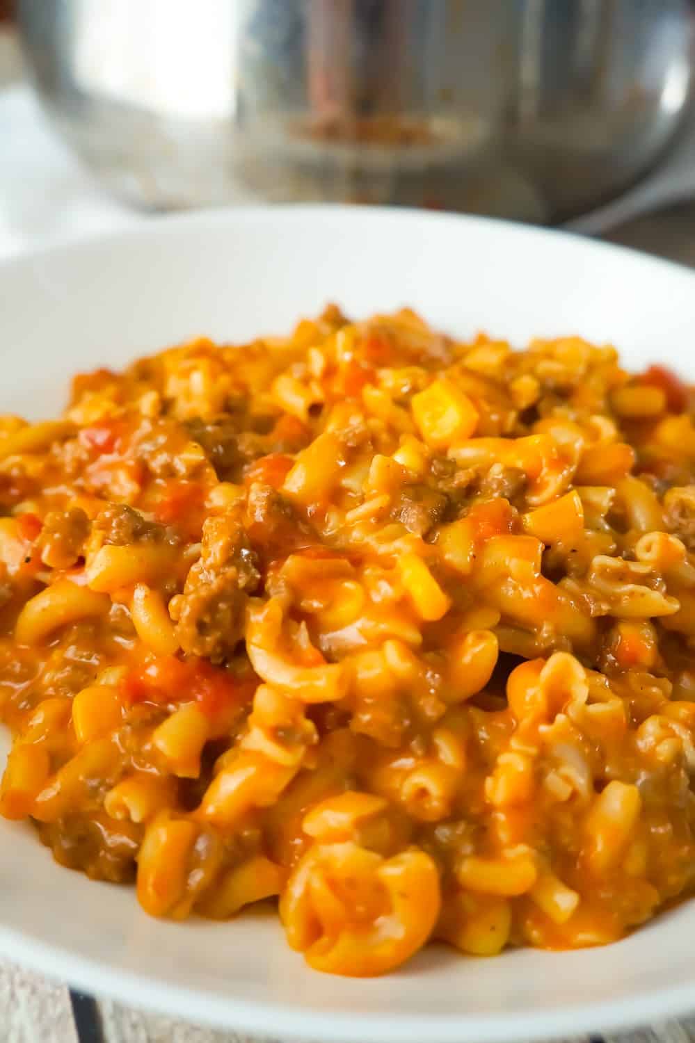 Cheesy Beef Goulash with Corn is an easy weeknight dinner recipe that takes less than 30 minutes from start to finish. This one pot dinner is loaded with diced tomatoes, macaroni noodles, ground beef corn and mozzarella cheese.