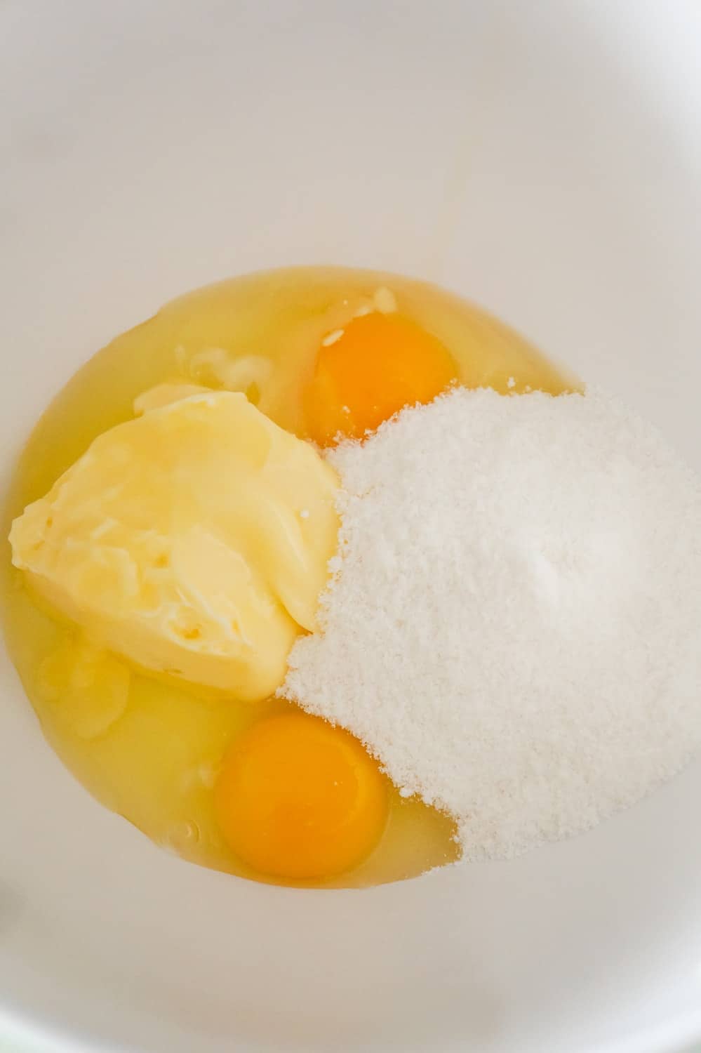 softened butter, eggs and vanilla instant pudding mix in a mixing bowl