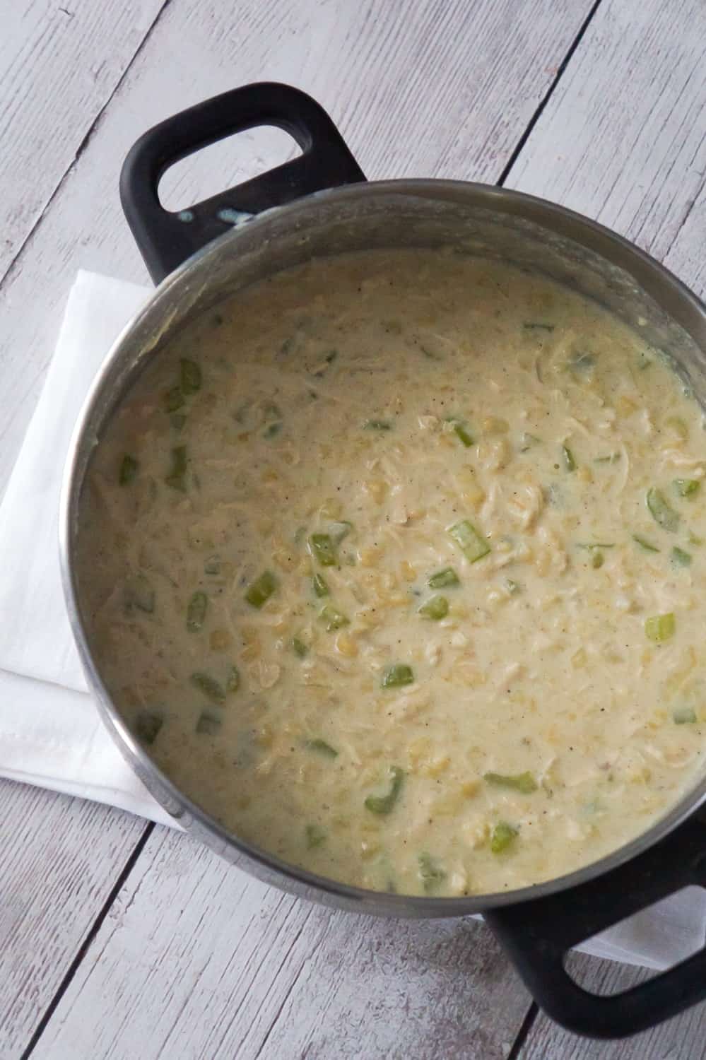 Creamy Chicken Noodle Soup is a hearty comfort food dish perfect for cold weather. This easy soup recipe is loaded with rotisserie chicken and alphabet noodles.