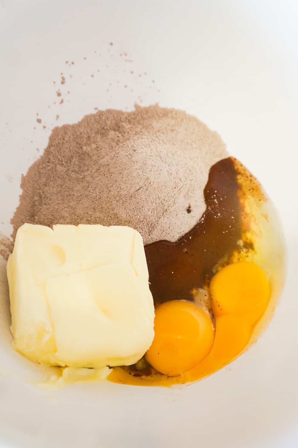 butter, chocolate pudding mix and eggs in a mixing bowl