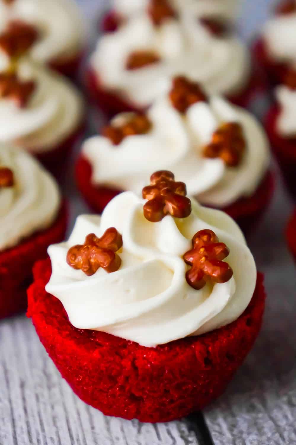 Red Velvet Brownie Bites are delicious mini desserts perfect for the holidays. These bite sized brownies are baked in mini muffin tins and topped with cream cheese frosting.