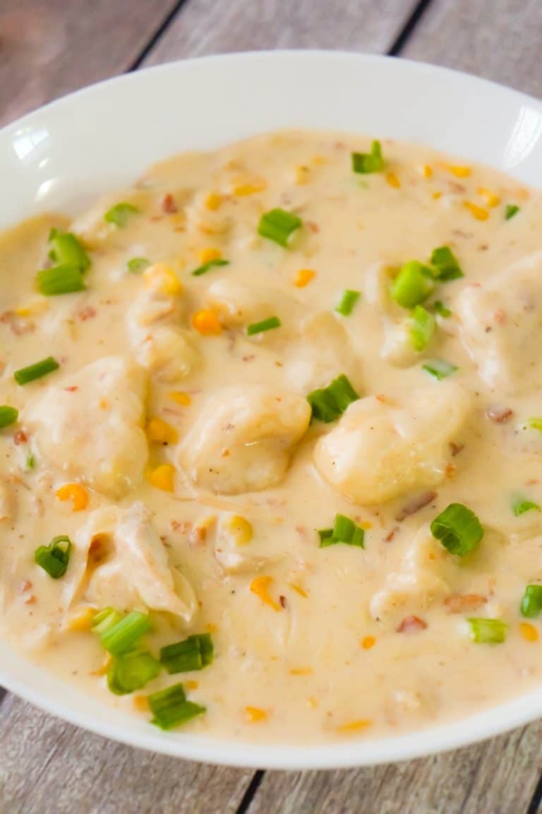Cajun Chicken and Dumplings with Bacon are an easy chicken dinner recipe using Pillsbury refrigerated biscuits. This thick and creamy dish is loaded with rotisserie chicken, corn, real bacon bits and seasoned with Clubhouse Cajun spice for a bit of a kick.