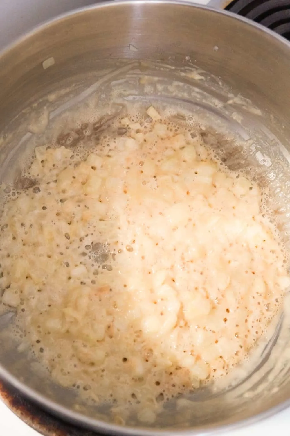 diced onions and flour cooking in butter in a large pot