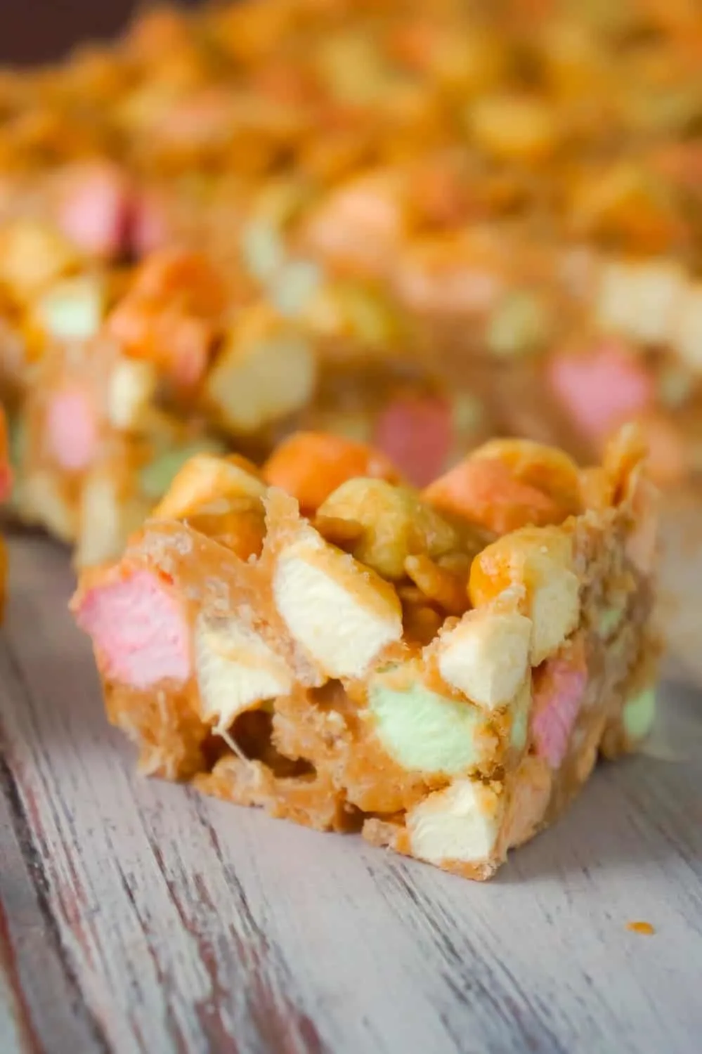 Peanut Butter Marshmallow Bars are an easy dessert recipe perfect for your holiday treat tray. These peanut butter and butterscotch confetti squares are loaded with colourful mini marshmallows, Rice Krispies and shredded coconut.