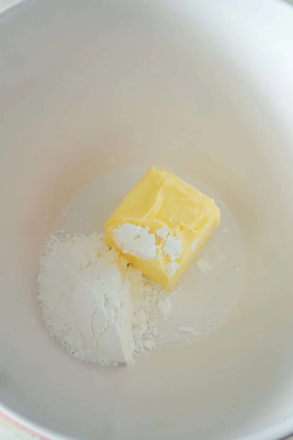 softened butter and confectioner's sugar in a mixing bowl