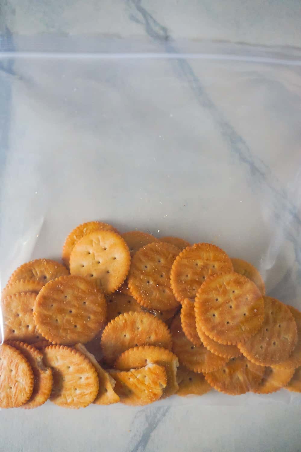 Ritz crackers in a large Ziploc bag