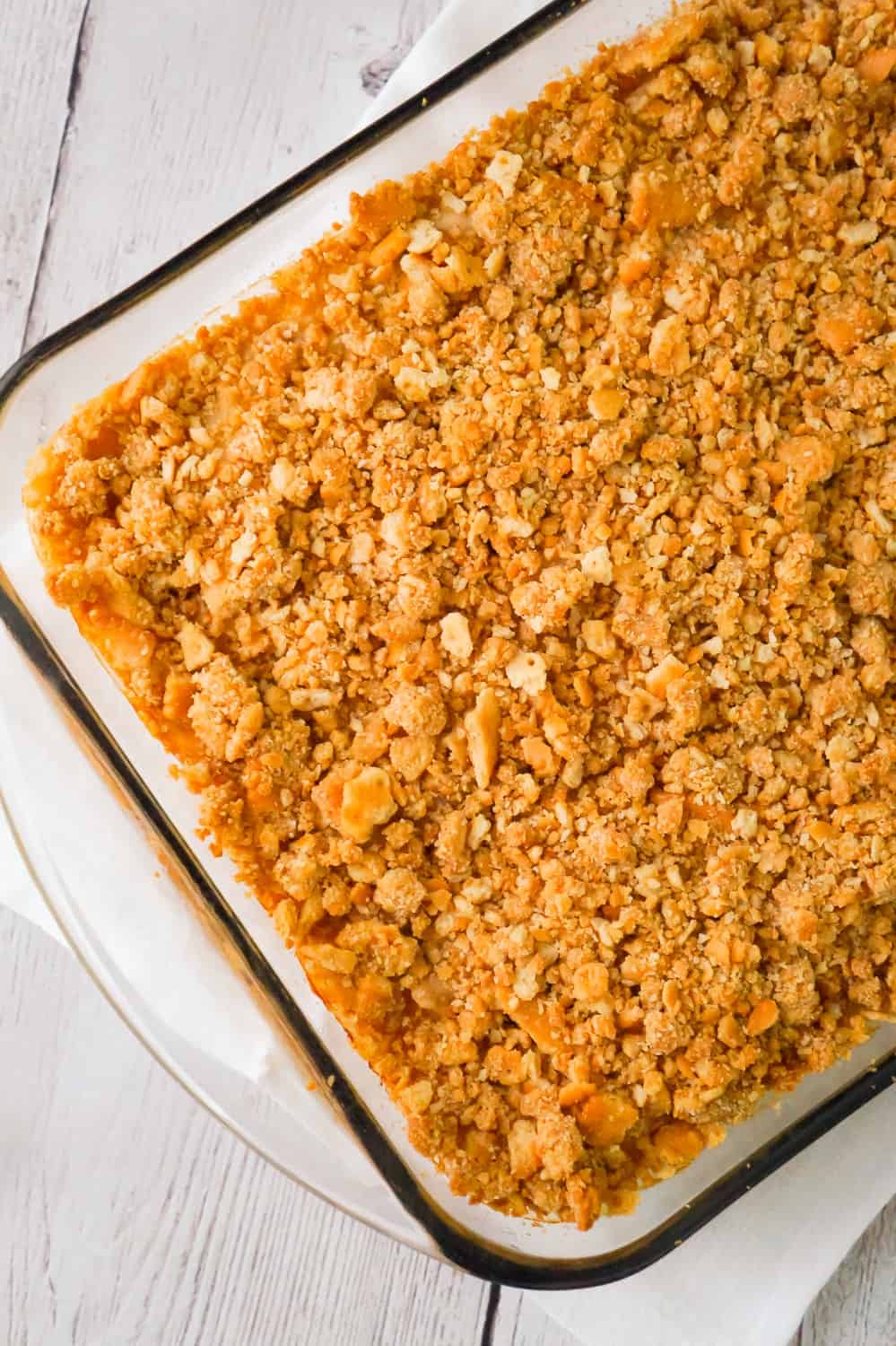 Easy Chicken and Rice Casserole is a hearty dinner recipe perfect for cold weather. This delicious chicken casserole is loaded with long grain rice, Campbell's cream of chicken soup, corn and topped with crumbled Ritz crackers.