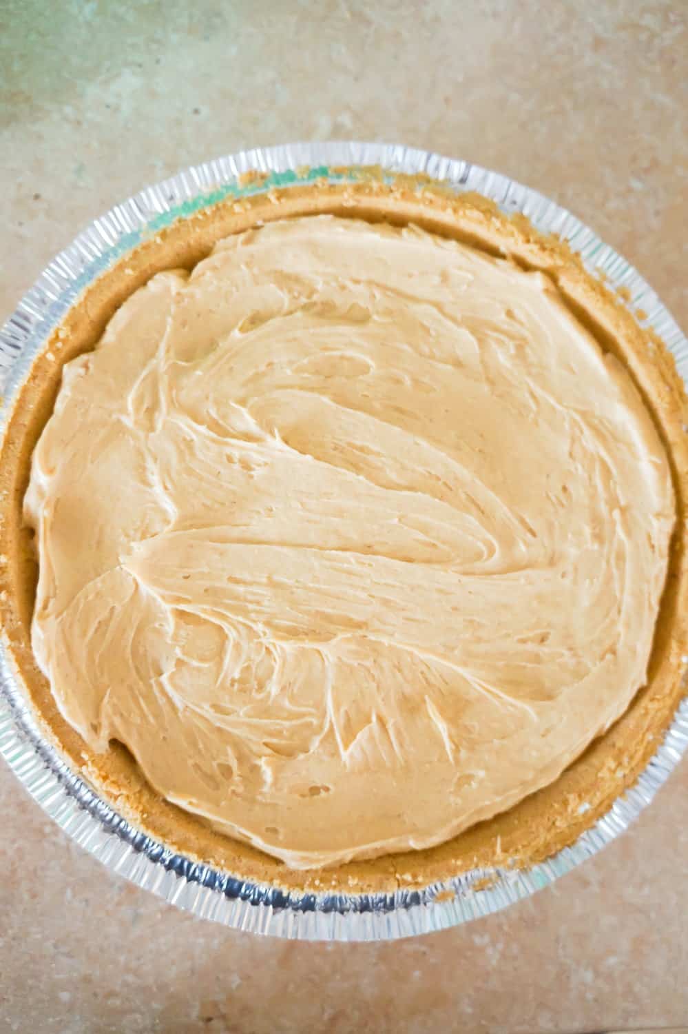 peanut butter filling in a graham pie crust