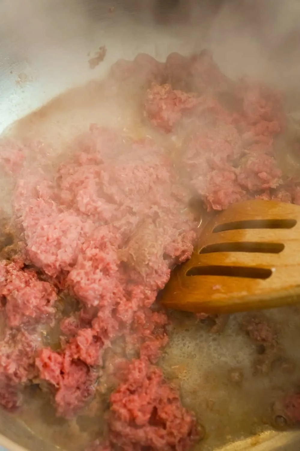 ground beef cooking in a pot