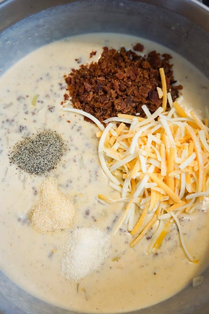 shredded cheddar cheese, real bacon bits and spices added to bacon cheeseburger