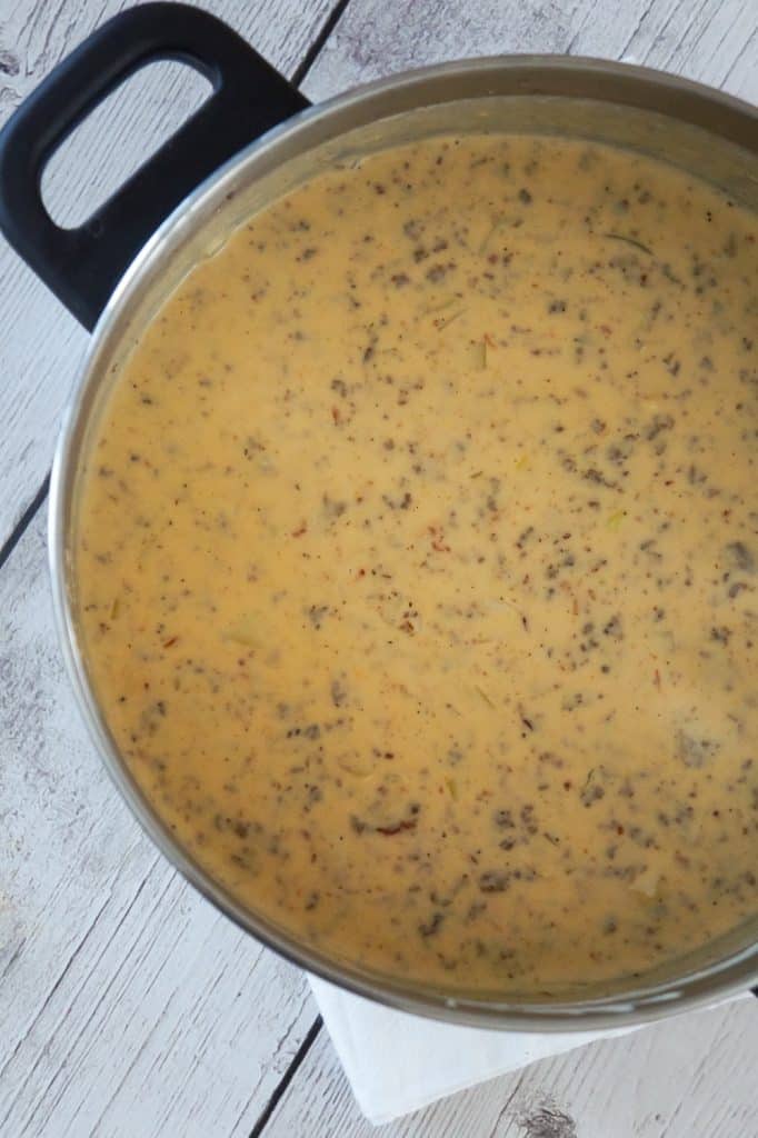Bacon Cheeseburger Soup is a hearty soup recipe that can be whipped up in just fifteen minutes. This tasty dish made with Campbell's Cream of Bacon soup and Campbell's Cheddar Cheese soup, is loaded with ground beef, real bacon bits and cheddar cheese.
