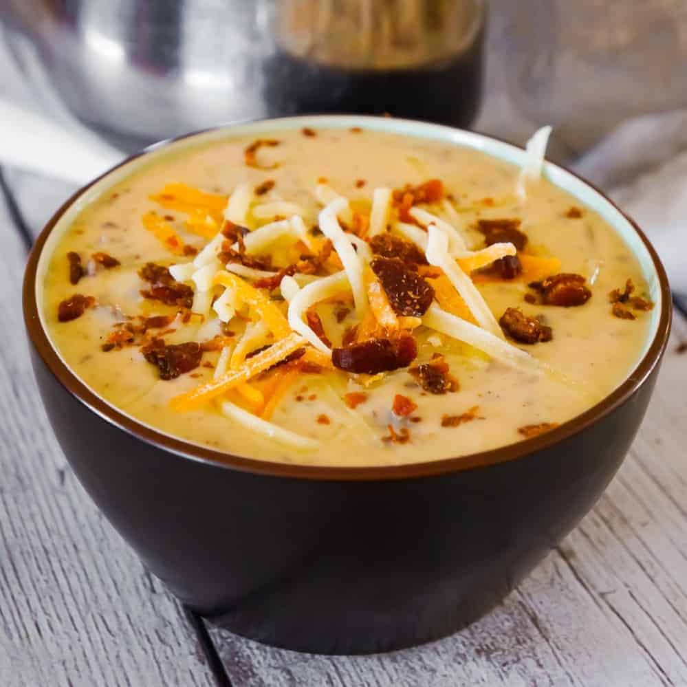 Bacon Cheeseburger Soup is a hearty soup recipe that can be whipped up in just fifteen minutes. This tasty dish made with Campbell's Cream of Bacon soup and Campbell's Cheddar Cheese soup, is loaded with ground beef, real bacon bits and cheddar cheese.