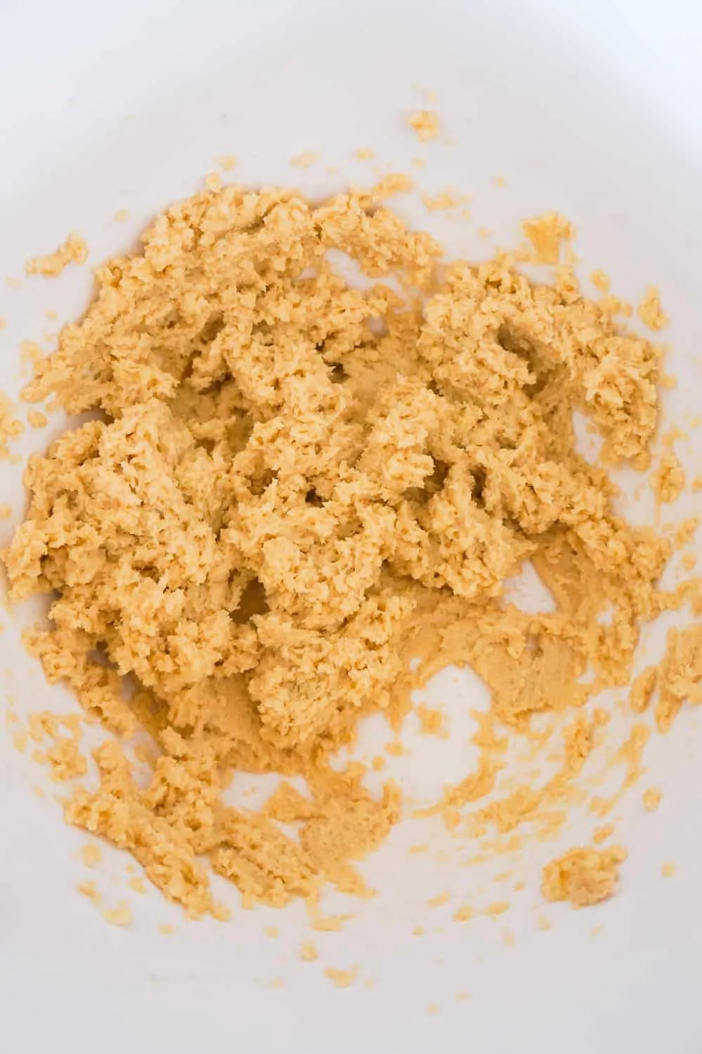 Crisco, brown sugar and granulated sugar creamed together in a mixing bowl