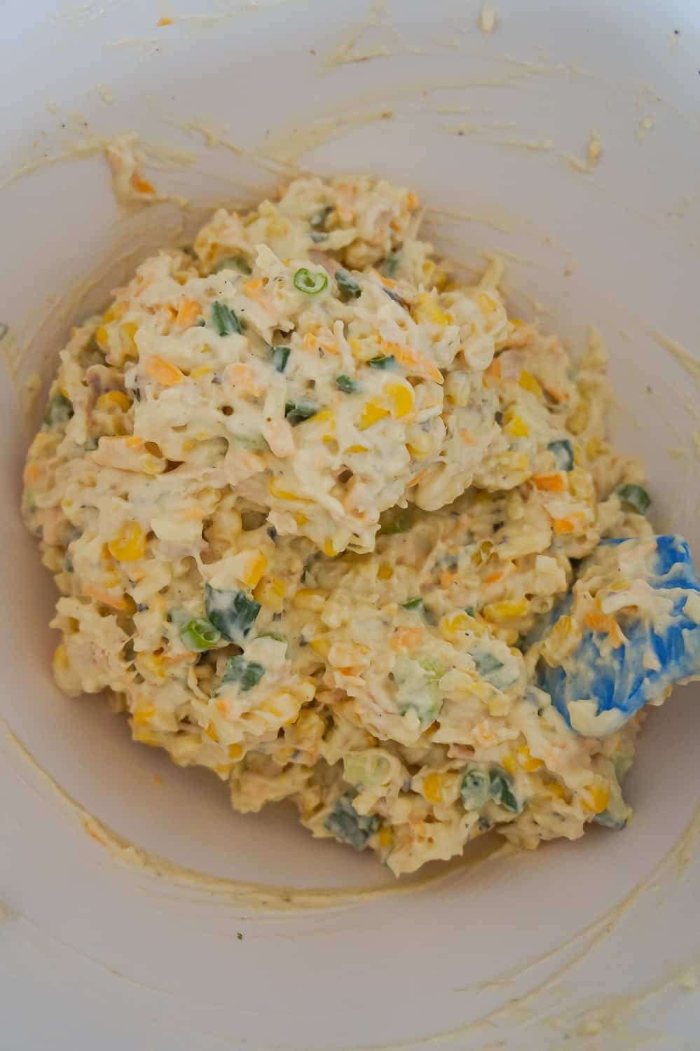 creamy chicken mixture in a mixing bowl