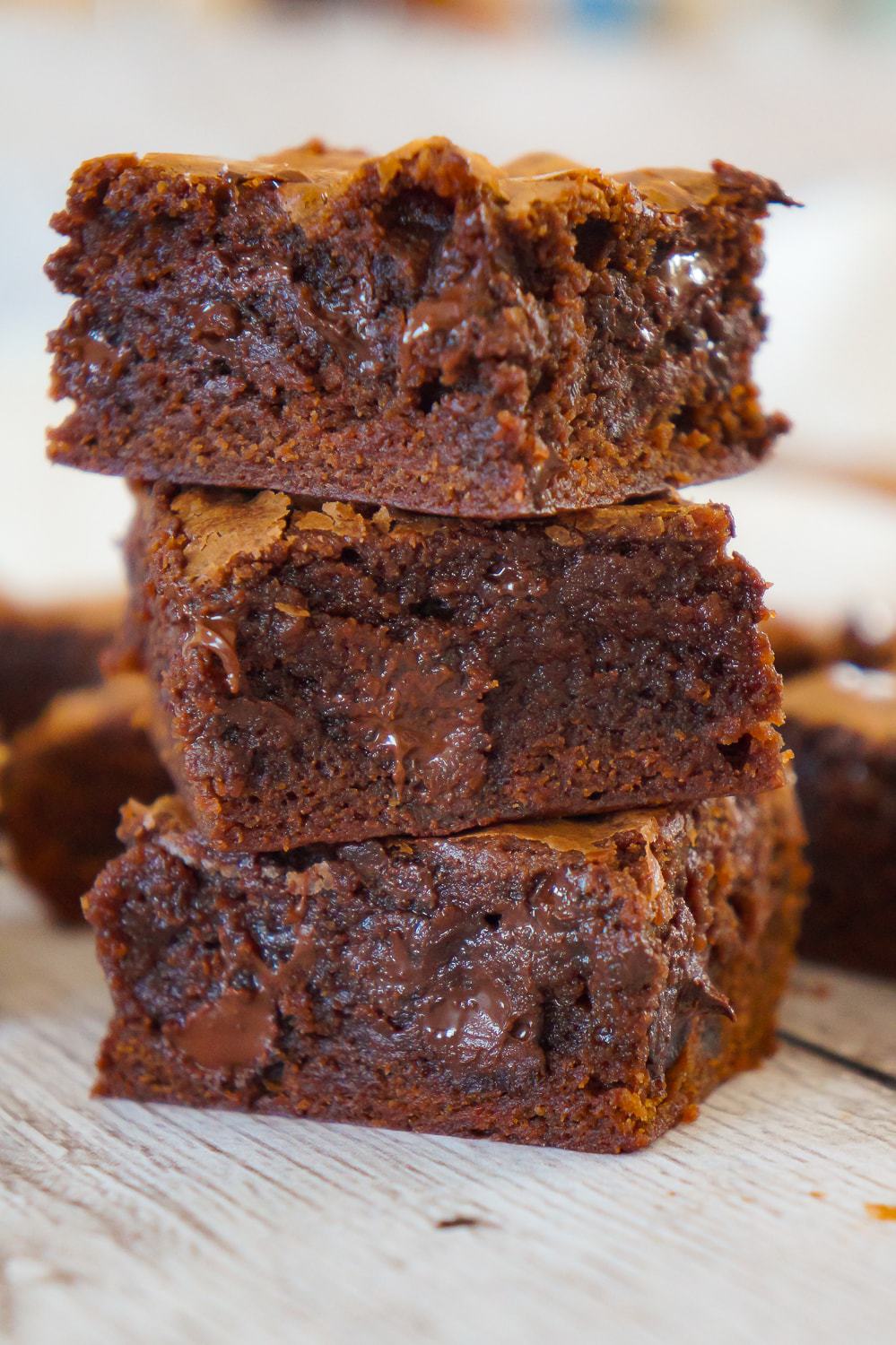 Homemade Brownies from Scratch are a decadent and chewy chocolate dessert. These delicious brownies are loaded with semi sweet and dark chocolate chips.