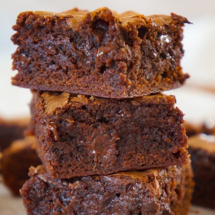 Homemade Brownies from Scratch are a decadent and chewy chocolate dessert. These delicious brownies are loaded with semi sweet and dark chocolate chips.